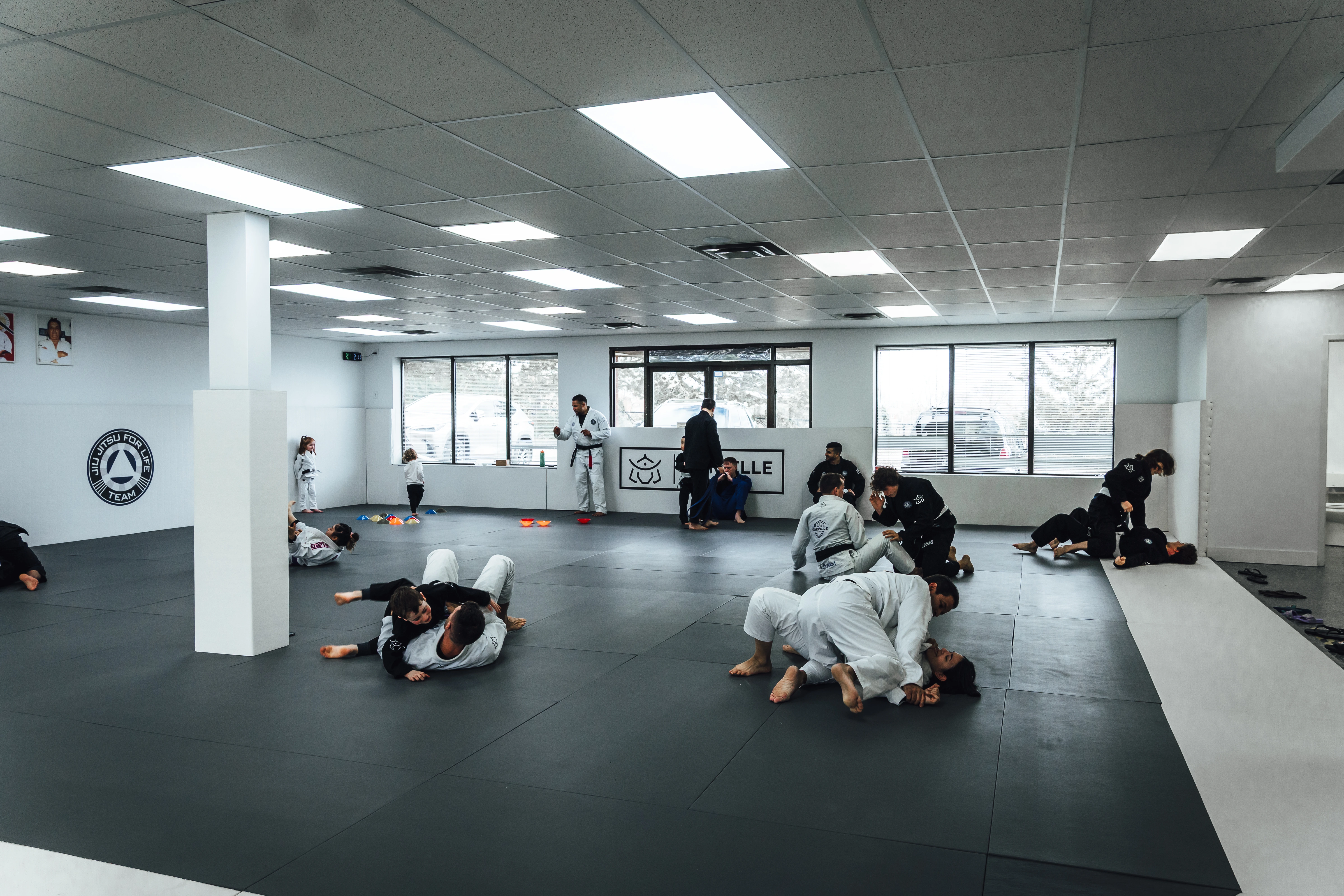 Oakville Brazilian Jiu-Jitsu class in session with students drilling technique